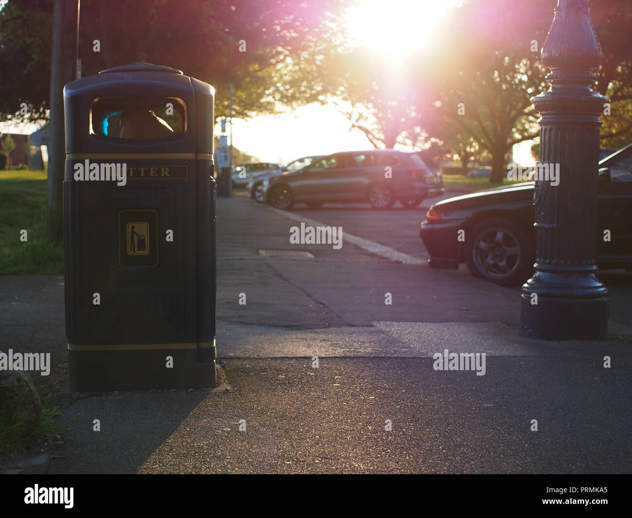 Litter bin on pavement hi-res stock photography and images - Alamy