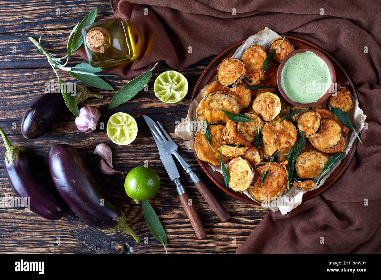crispy Fried Eggplant Aubergine slices on a earthenware plate with
