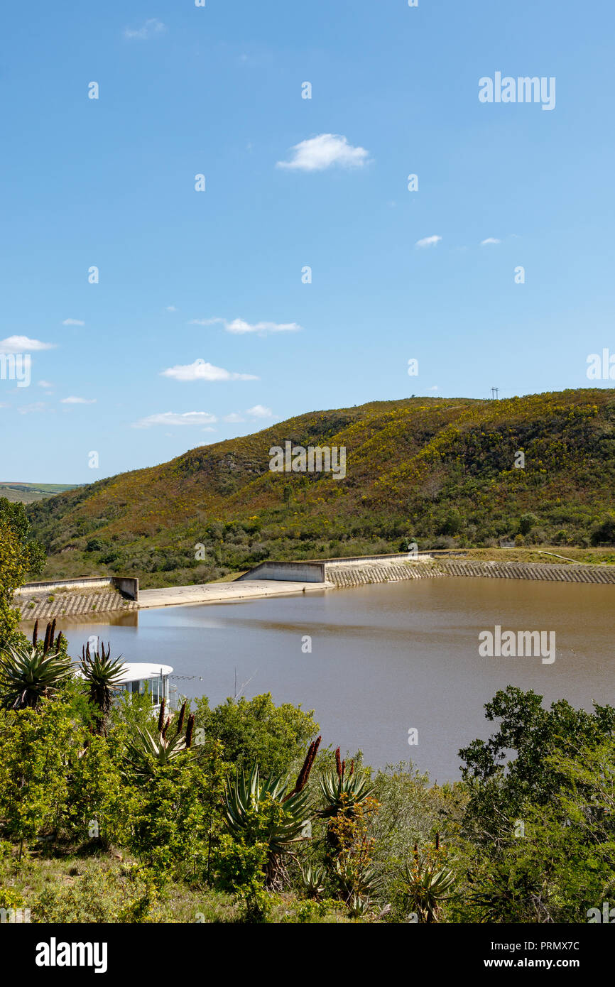 The water flowing to the edge of the dam, close to overflowing Stock Photo