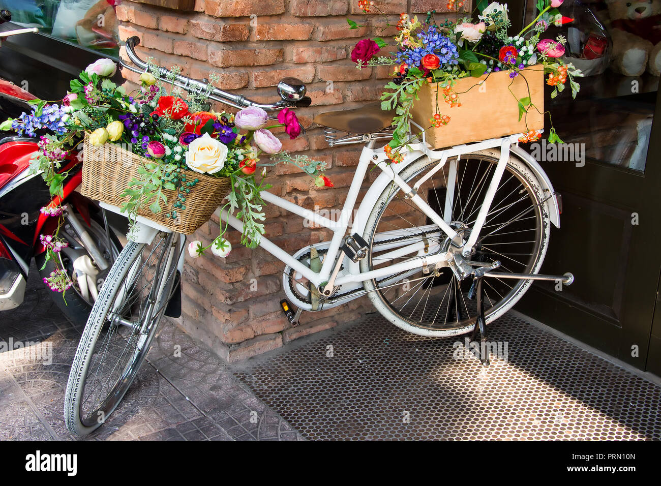old bicycle decorated with flowers