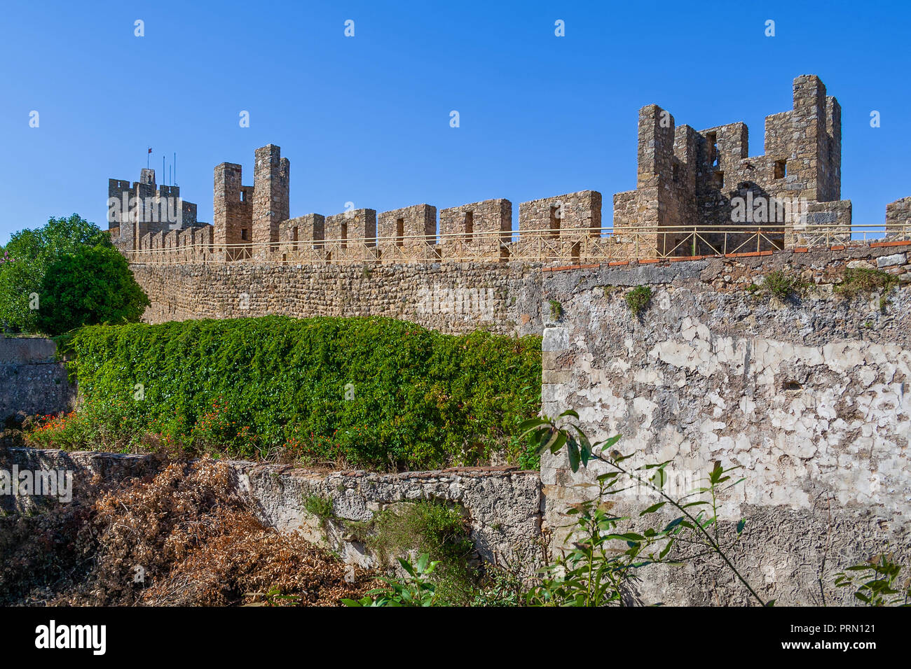 Castle of Tomar. The Knights Templar fortress which surrounds and protects the Convent of Christ or Convento de Cristo. Tomar, Portugal Stock Photo