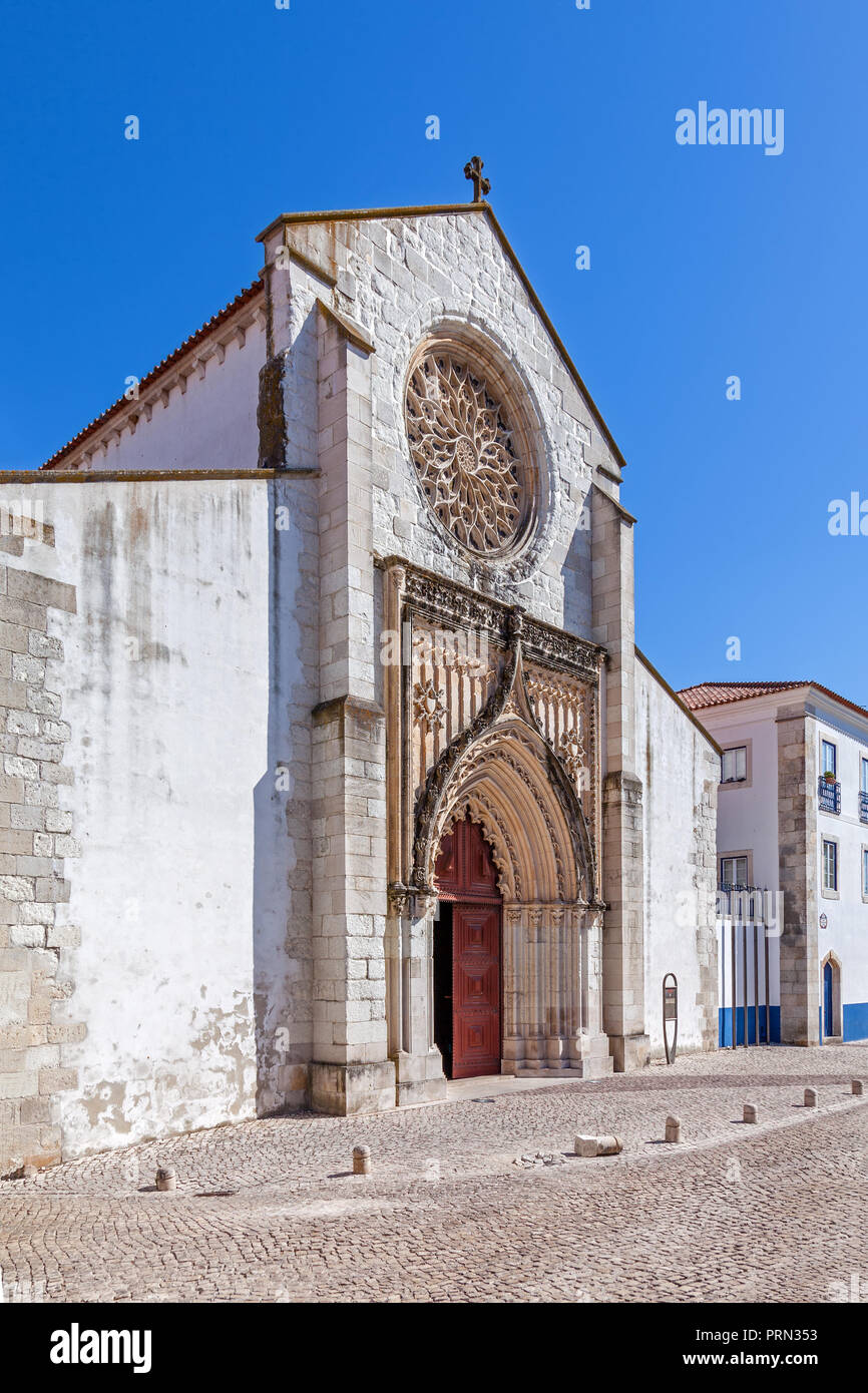 Santarem, Portugal. Igreja de Santo Agostinho da Graca church, with largest Rose Window carved of a single slab in Portugal. 14th and 15th century Men Stock Photo