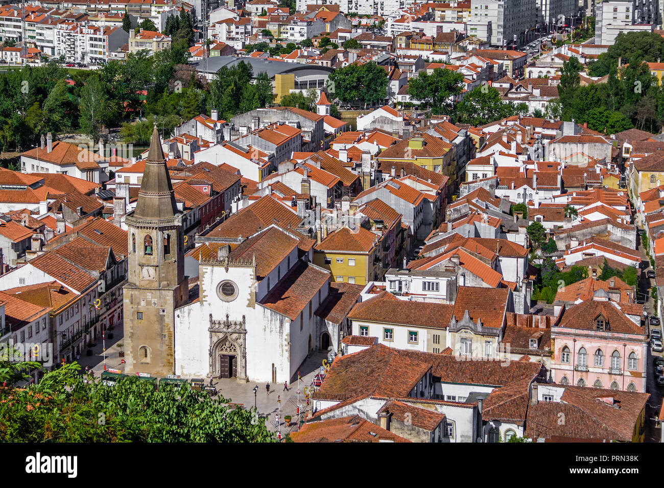 Tomar, Portugal. The city of Tomar with Igreja de Sao Joao Baptista Church and Republica Square. Seen from the Castle of Tomar and Convento de Cristo Stock Photo