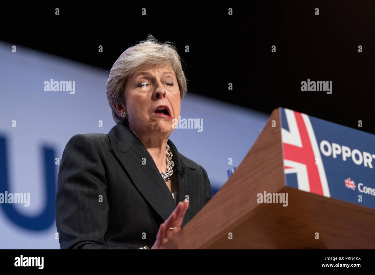 Birmingham, UK. 3 October 2018 - Prime Minister Theresa May pulls a funny  face whilst she delivers her speech at Conservative Party Conference 2018  in Birmingham, UK. Credit: Benjamin Wareing/Alamy Live News