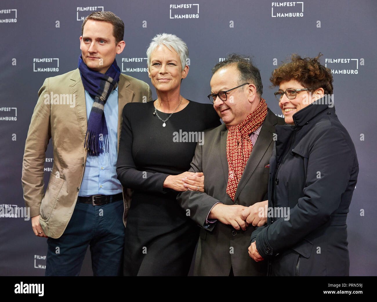 02 October 2018, Hamburg: Michael Kampf (l-r), Marketing Director Universal Pictures, Jamie Lee Curtis, actress and producer from the USA, Albert Wiederspiel, Director Filmfest Hamburg, and Kathrin Kohlstedde, Programme Director Filmfest Hamburg, come to the premiere of "Halloween" at Filmfest Hamburg. Photo: Georg Wendt/dpa Stock Photo