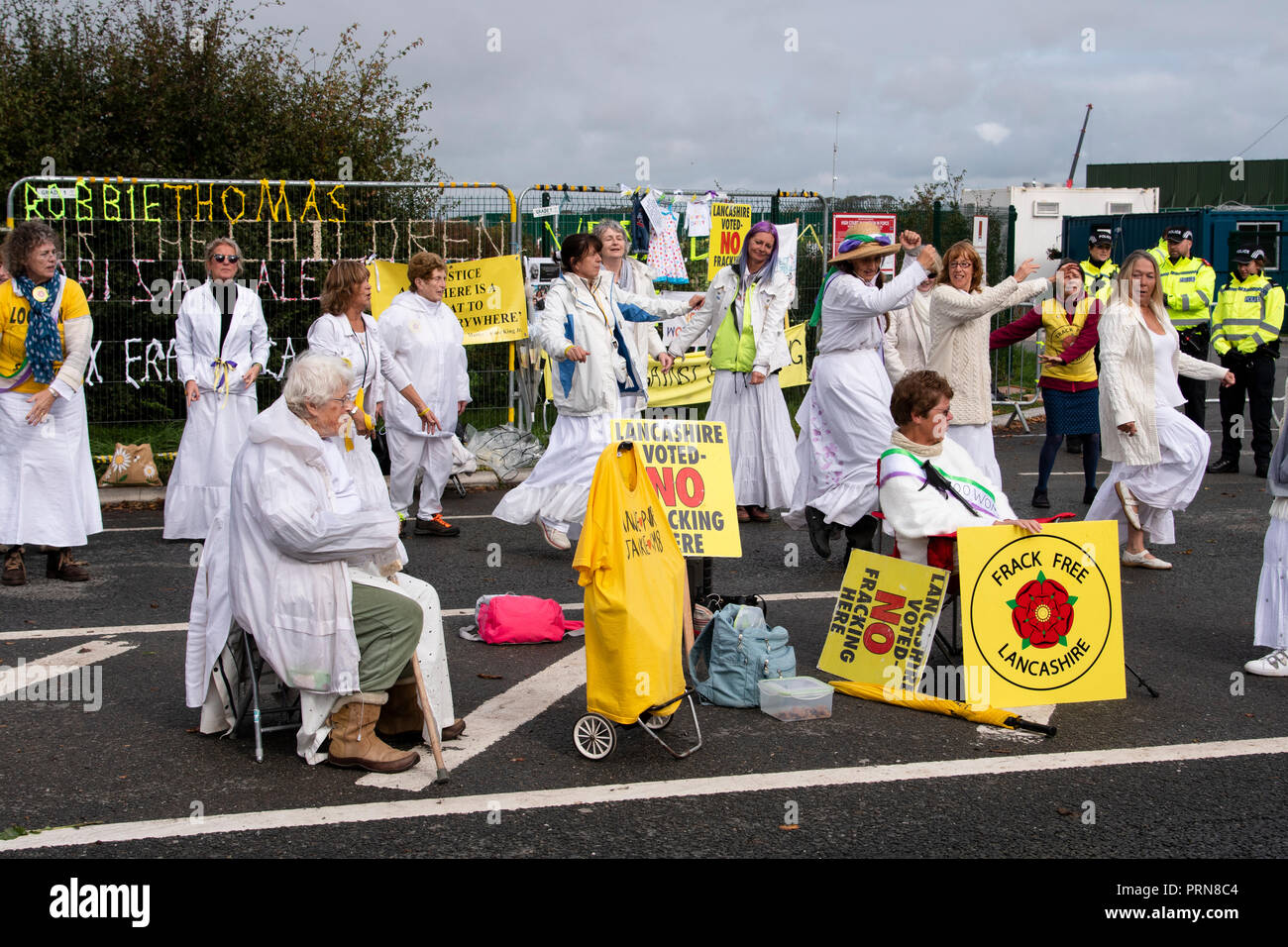 Plumpton, Blackpool, Britain. 3rd Oct, 2018. Anti-fracking protester cut free from a lock-on  device after 3 day protest in the entrance to the Cuadrilla exploratory site on Preston New Road, Little Plumpton, near Blackpool. Several protesters started the protest on Monday in support of the three anti-fracking protesters who were recently jailed and to coincide with the start of the Conservative Party Conference being held in Birmingham. Stock Photo