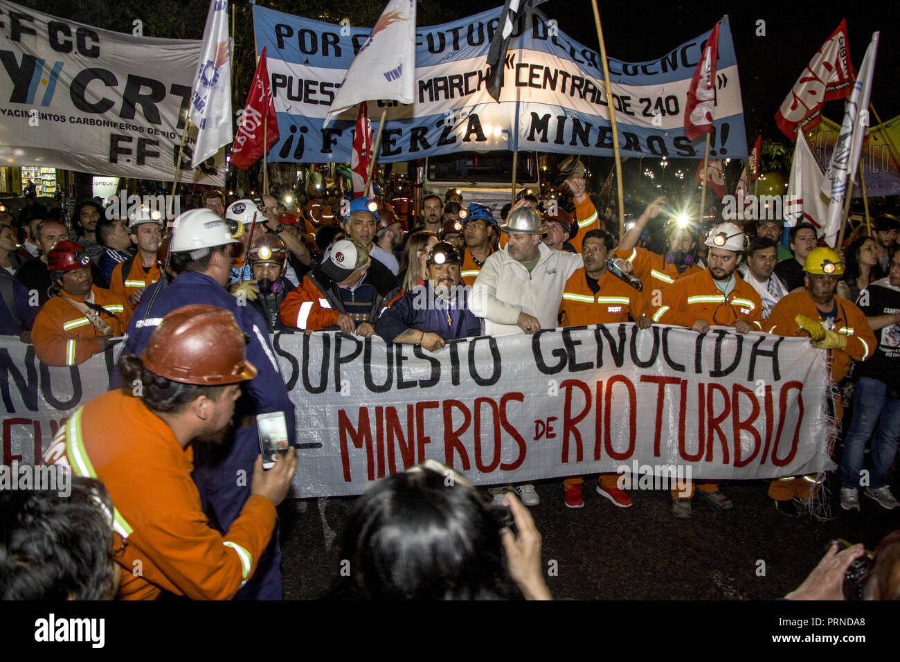 Buenos Aires, Federal Capital, Argentina. 3rd Oct, 2018. This a day of protest by a commission of the Intersindical Basin Carbonifera River Turbio in the context of the Carboniferous Field conflict and repudiation of the national budget 2019. Beginning With different union activities and accompanying other guilds in their struggle, the mining workers carried out what was called ''El Carbonazo'' as a symbolic embrace in front of the National Lesgilatura in the City of Buenos Aires. They literally took the coal to the door Credit: ZUMA Press, Inc./Alamy Live News Stock Photo