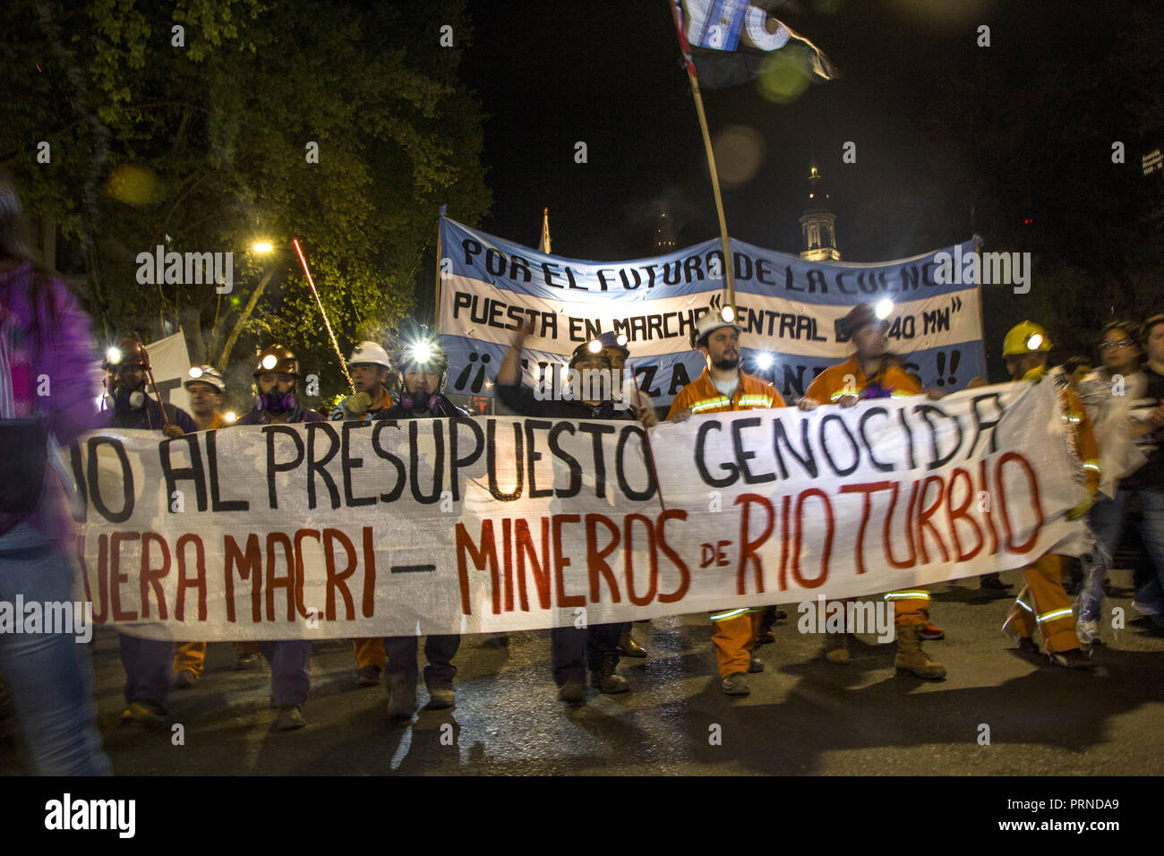 Buenos Aires, Federal Capital, Argentina. 3rd Oct, 2018. This a day of protest by a commission of the Intersindical Basin Carbonifera River Turbio in the context of the Carboniferous Field conflict and repudiation of the national budget 2019. Beginning With different union activities and accompanying other guilds in their struggle, the mining workers carried out what was called ''El Carbonazo'' as a symbolic embrace in front of the National Lesgilatura in the City of Buenos Aires. They literally took the coal to the door Credit: ZUMA Press, Inc./Alamy Live News Stock Photo