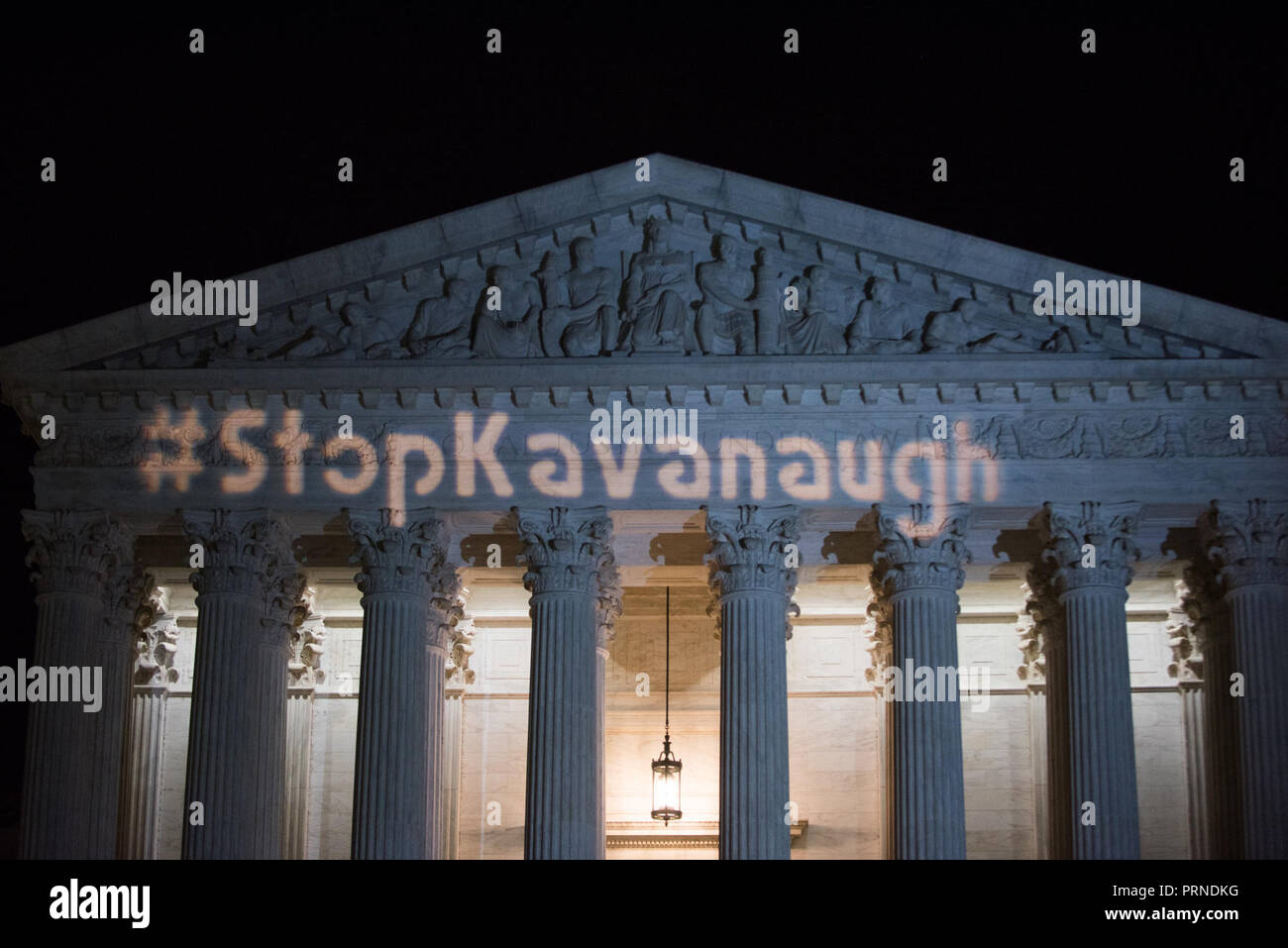 Washington DC, USA. October 3, 2018 - Stop Kavanaugh Rally at US Supreme Court.A light projection briefly shows ''#StopKavanaugh'' on the ediface of the US Supreme Court. It was quickly shut down by police. Zach D Roberts.Washington DC.USA.NEW.20181004 (Credit Image: © Zach RobertsZUMA Wire) Credit: ZUMA Press, Inc./Alamy Live News Stock Photo