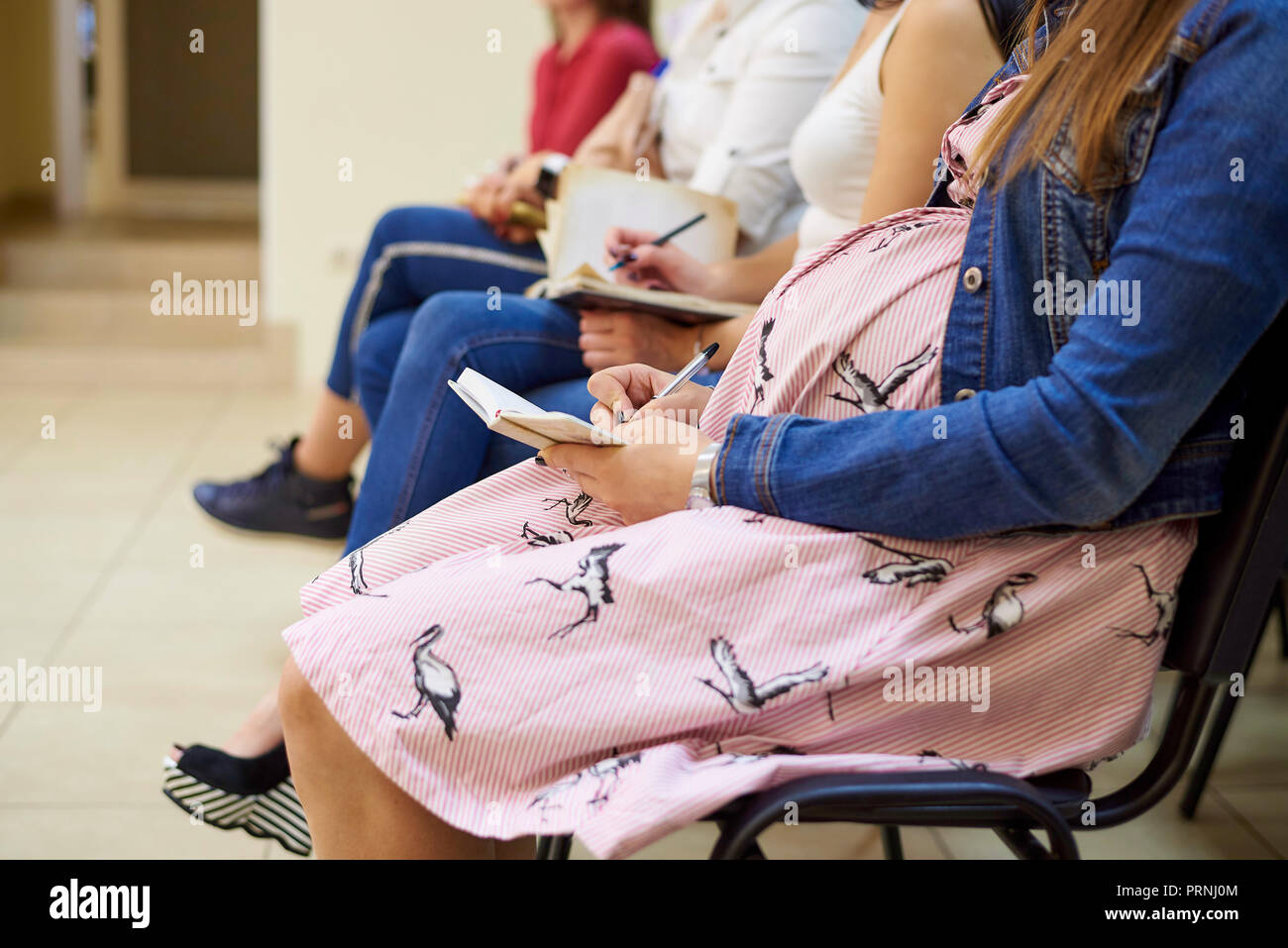 Group of pregnant women at courses for expectant mothers indoors Stock  Photo - Alamy