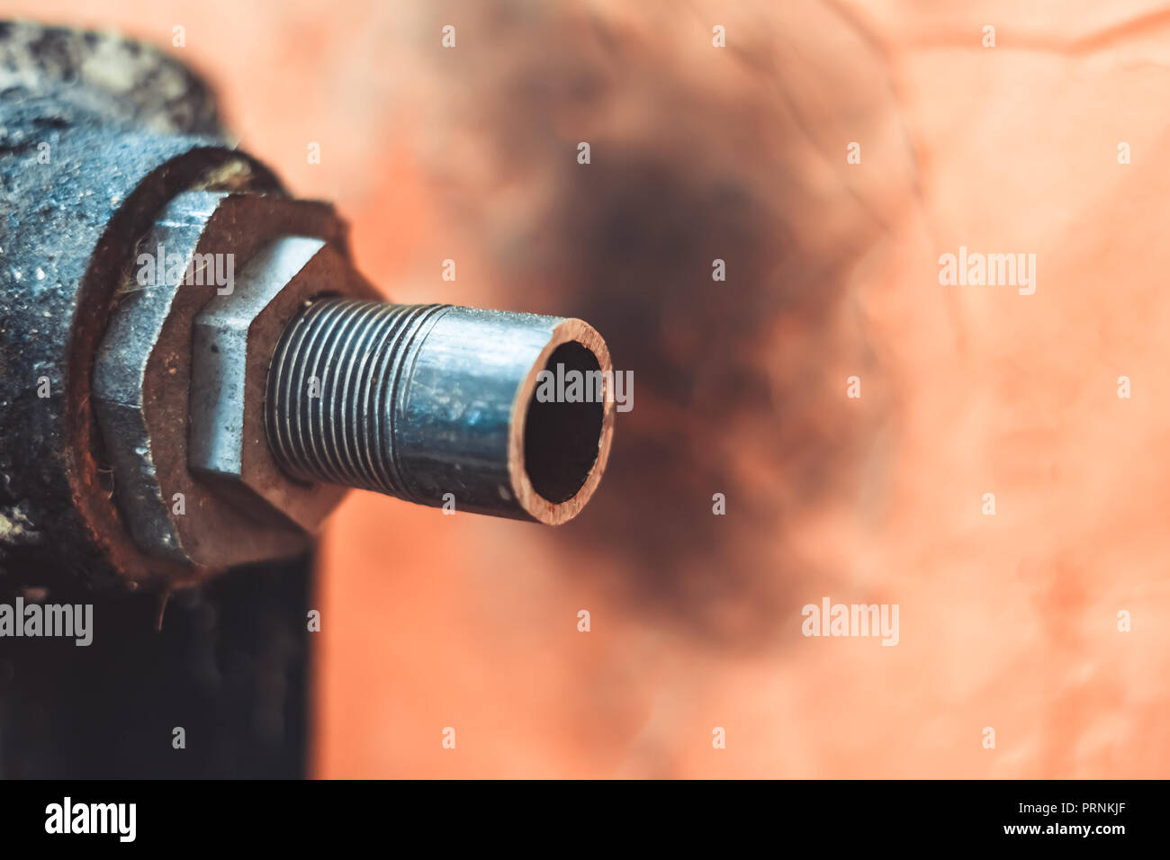 the radiator is broken, sawed off the end Stock Photo Alamy