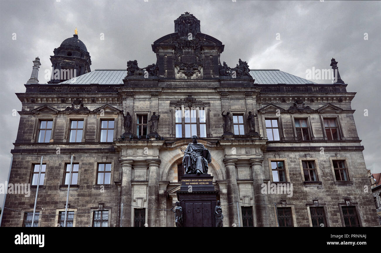 Facade of High Regional Court of Dresden with monument of Frederick