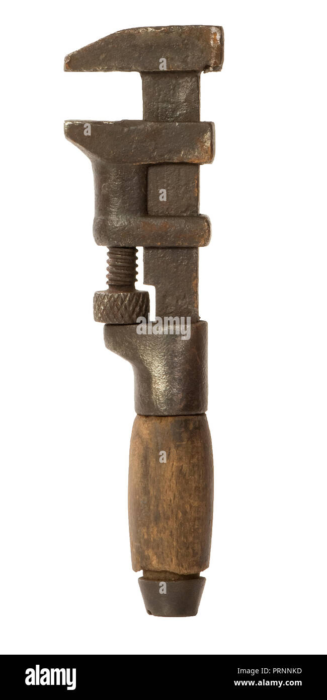 Old vintage wood handle pipe wrench Stock Photo