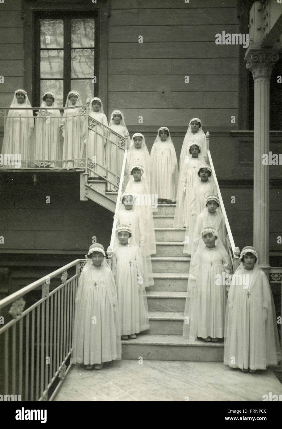 Girls dressed in white for their First Communion, Italy 1930s Stock ...