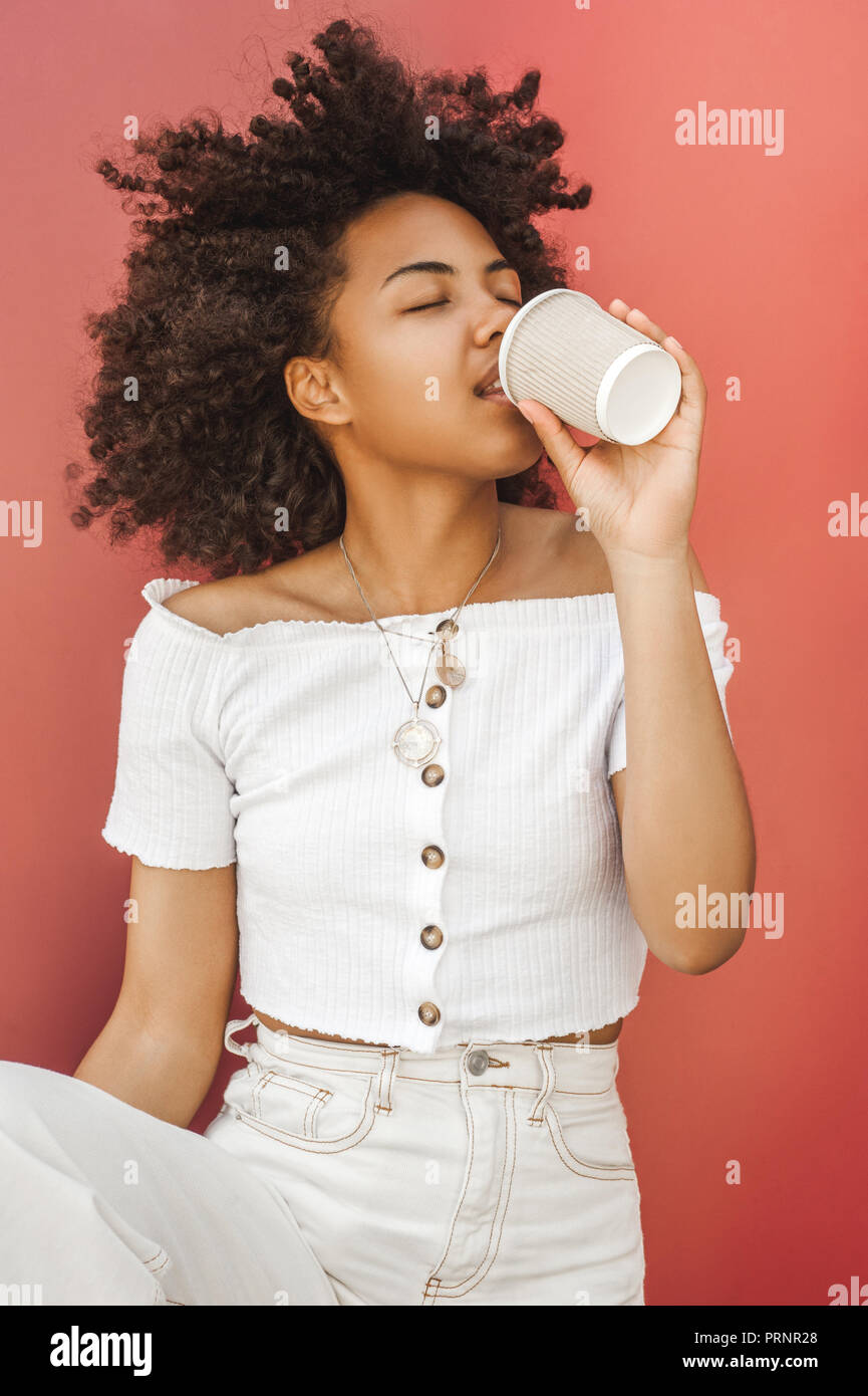 beautiful african american girl drinking coffee from paper cup Stock ...