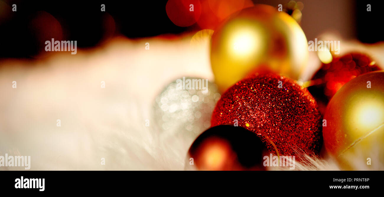 Colored Christmas ornaments on a carpet Stock Photo