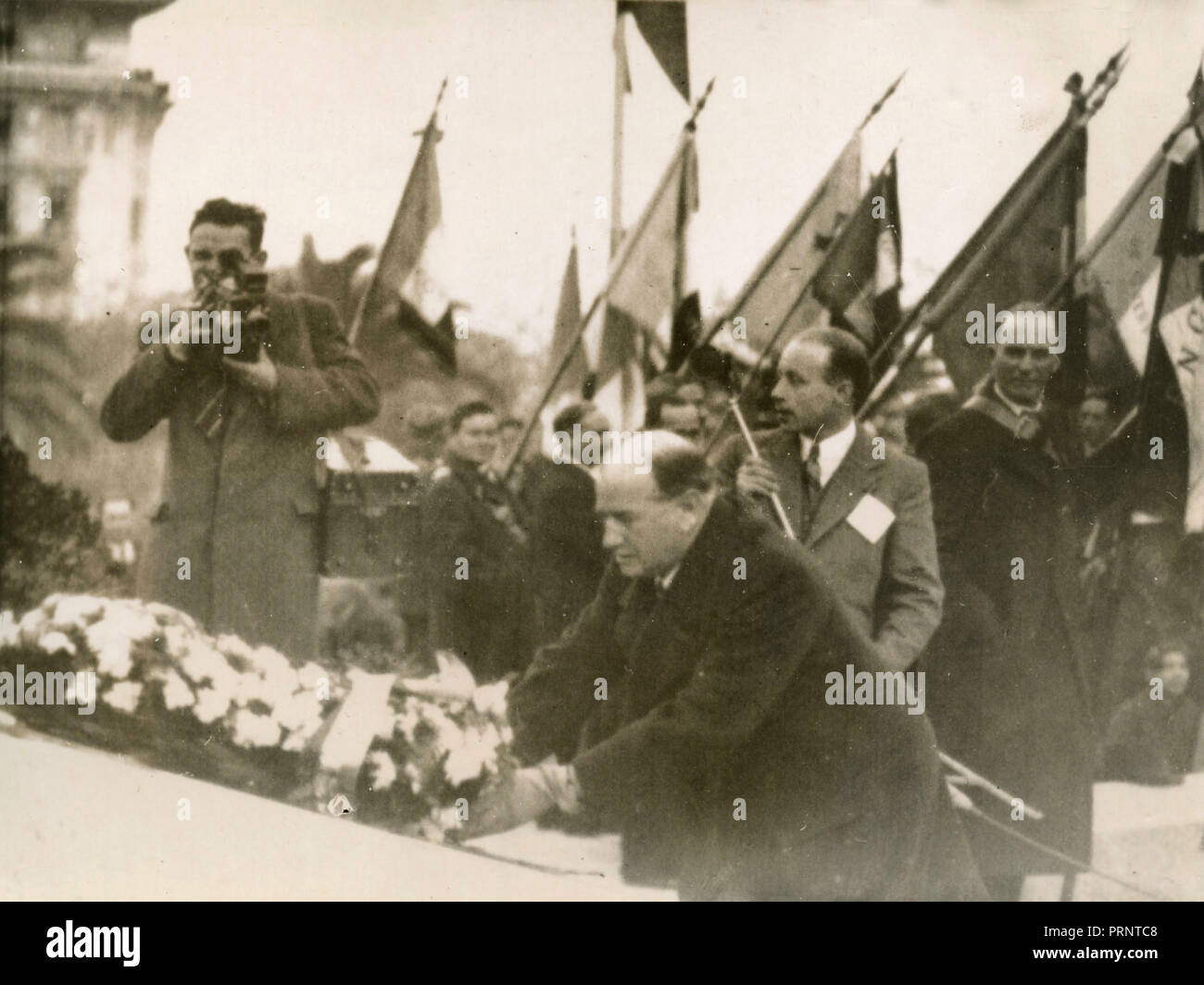 French PM Edouard Daladier deposing flowers at the Bastia memorial, France 1939 Stock Photo