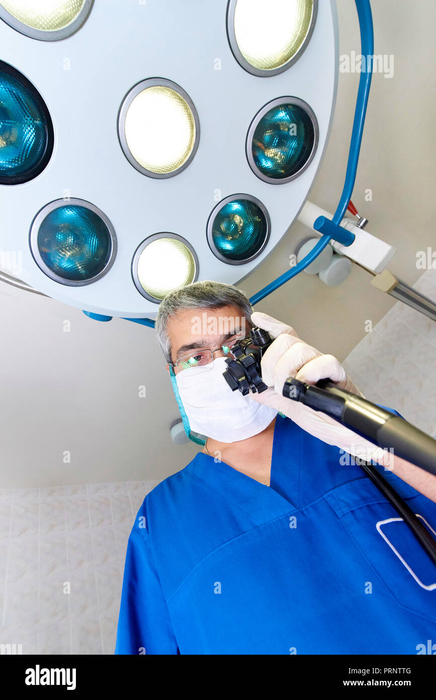 Endoscopy. Doctor holding endoscope before colonoscopy Stock Photo Alamy