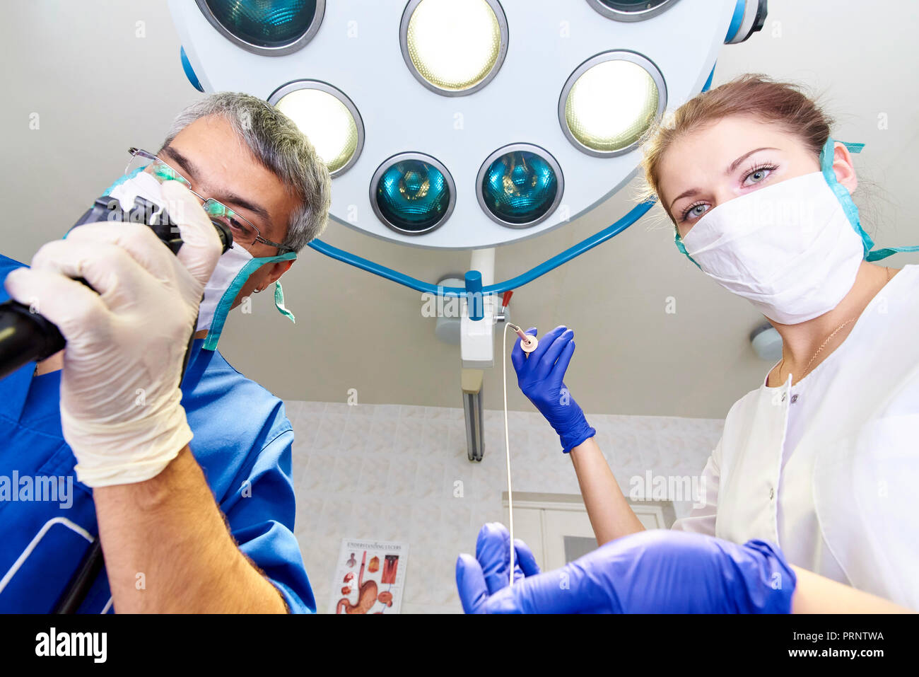 Endoscopy at the hospital. Doctor holding endoscope before gastroscopy ...