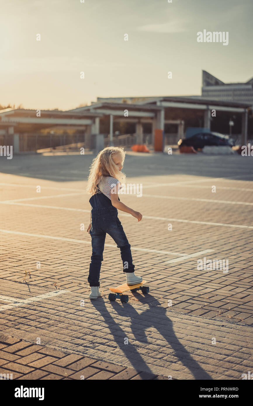 Kid standing rear view hi-res stock photography and images - Alamy