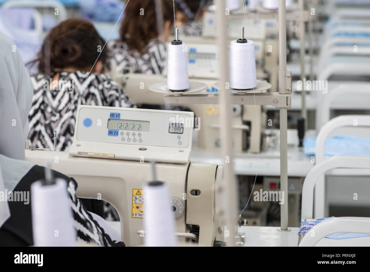 women in the textile factory. workers in the sewing working on