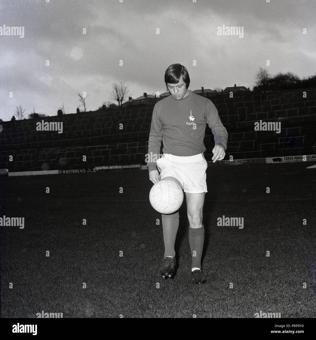 1970, October, Charlton Althetic Football Club, picture shows the club's new signing, midfield player, Walthamstow born, Dennis Bond out on the pitch in team strip with a ball. Stock Photo