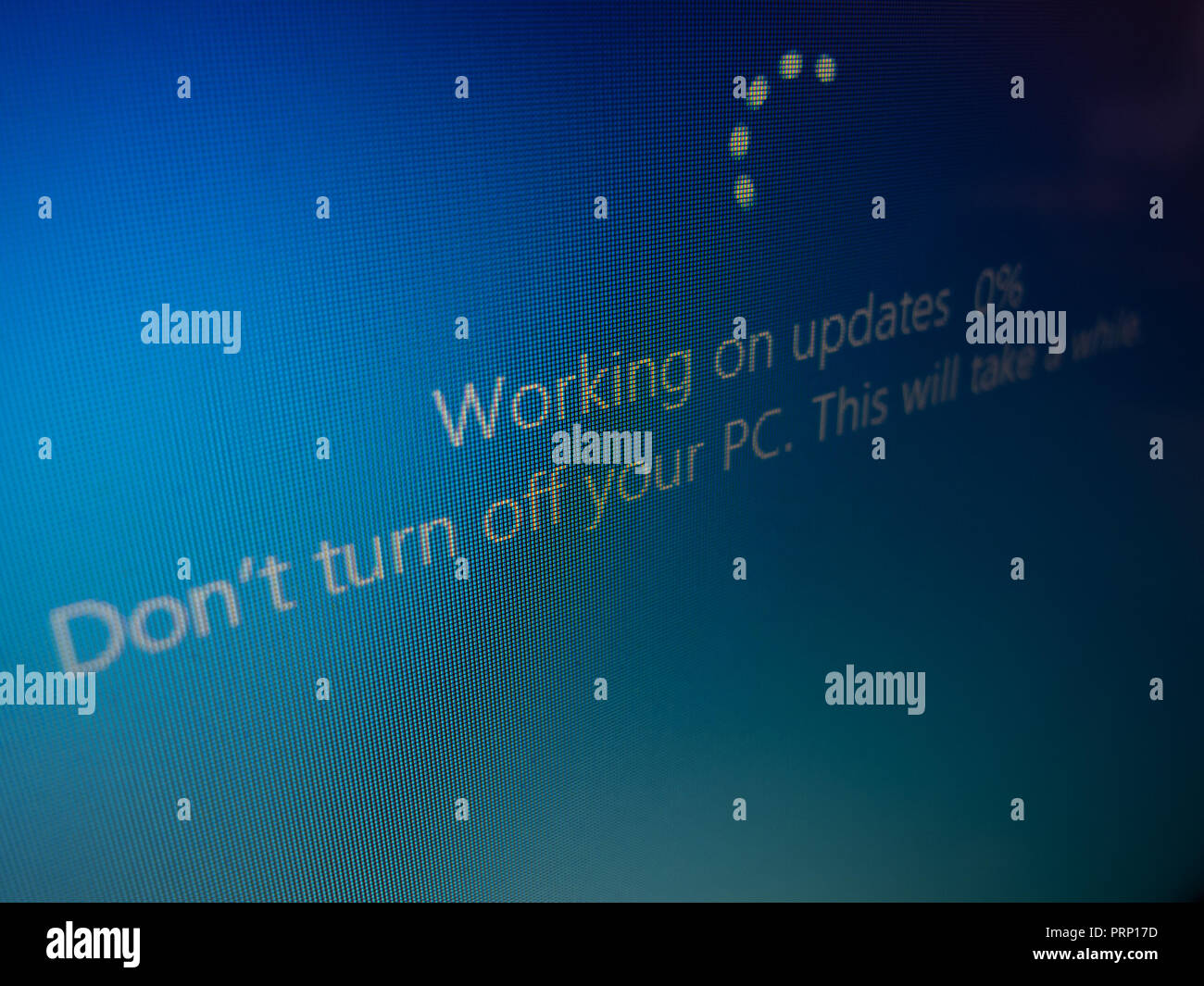 'Windows 10' working on updates (Feature update, version 1809), seen on laptop device screen on 