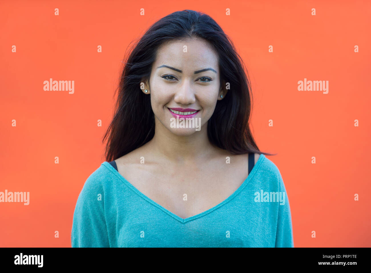 Young happy girl on colored background Stock Photo - Alamy