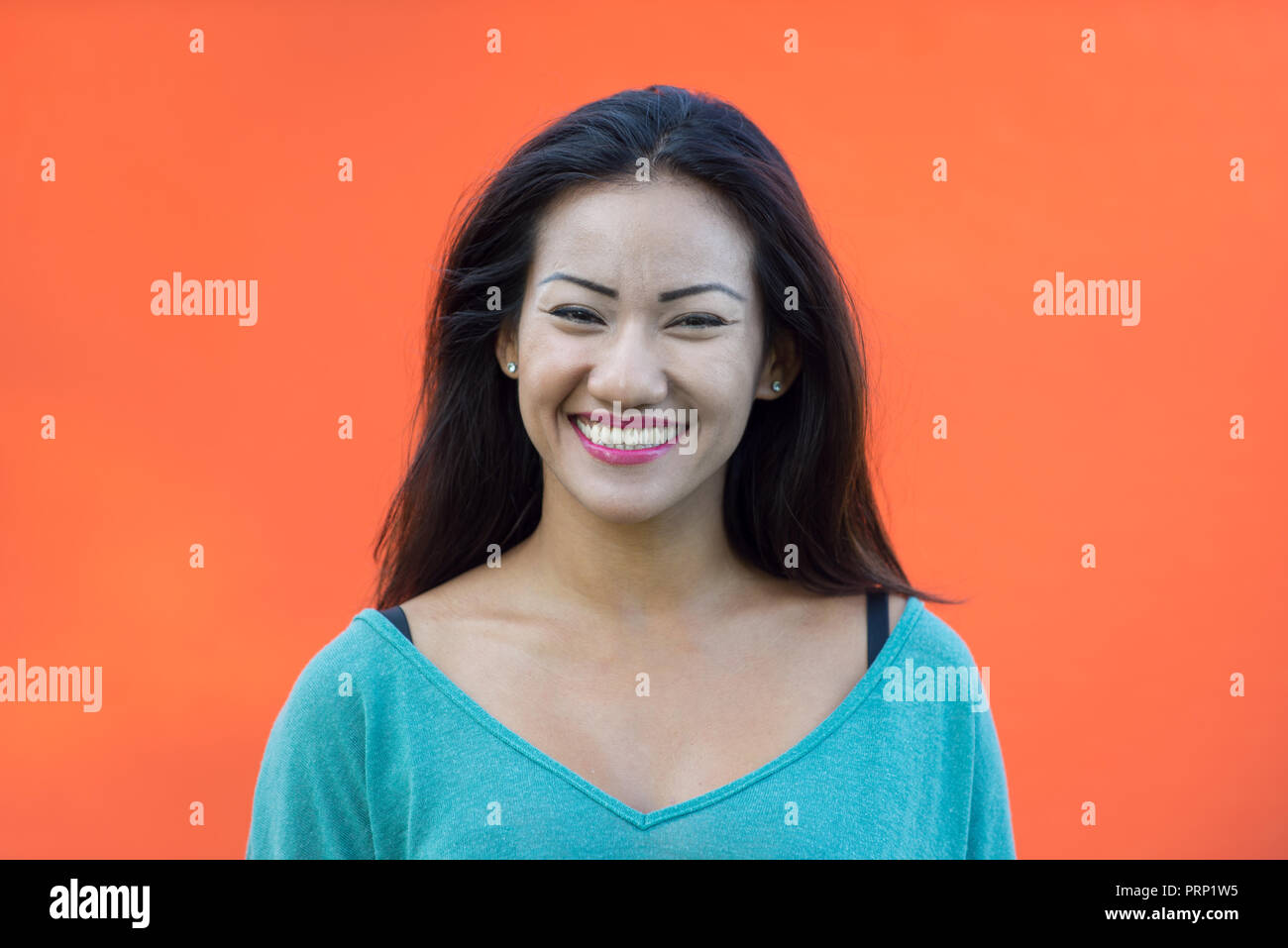 Smiling asian woman headshot hi-res stock photography and images