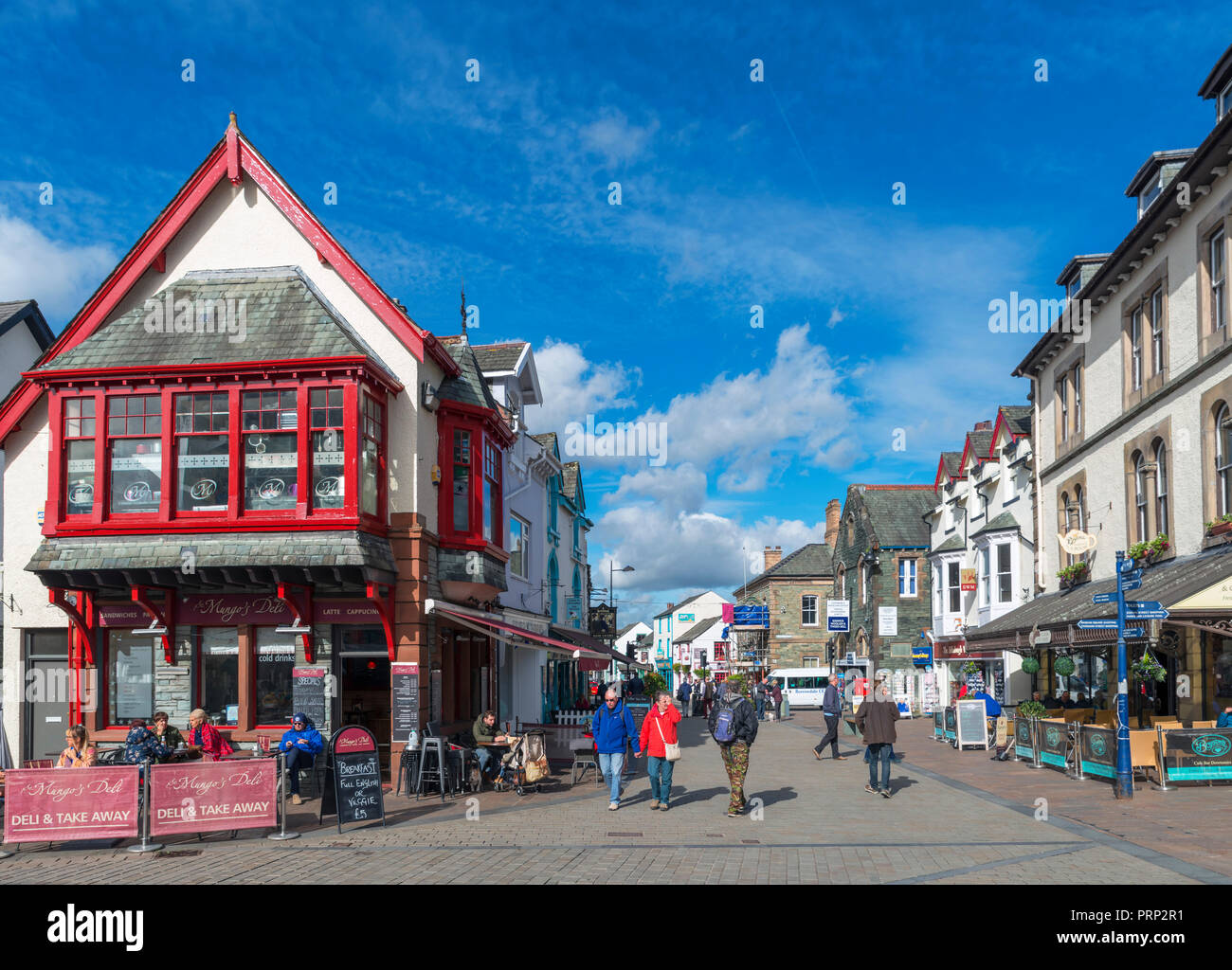 Shops and cafes on Main Street in Keswick, Lake District National Park, Cumbria, UK Stock Photo
