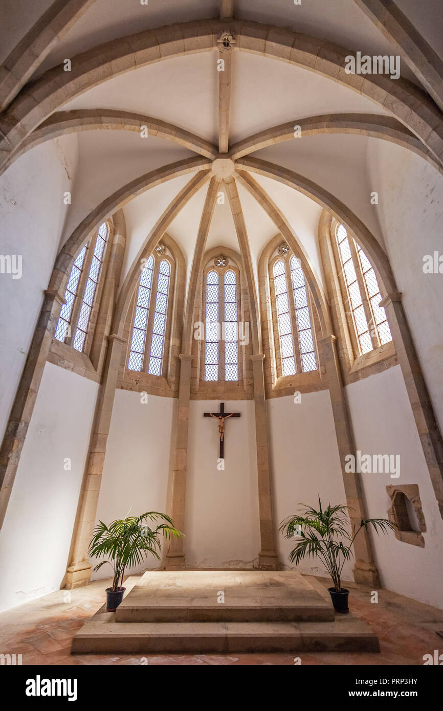 Santarem, Portugal - September 11, 2017: Interior of the Apse behind the altar of the Igreja de Santa Clara Church. 13th century Mendicant Gothic Arch Stock Photo