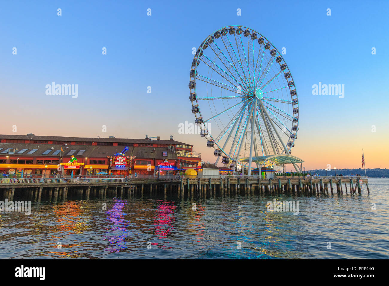 SEATTLE, WA, USA - JULY 24:  Seattle Great Wheel and Pier 57 on July 24, 2018 in Seattle, Washington. Stock Photo