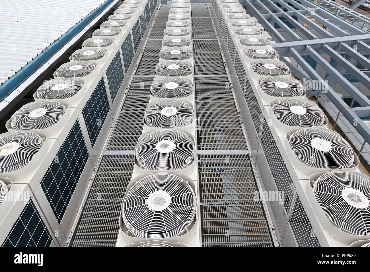 Central air conditioners condenser units at building rooftop Stock Photo -  Alamy