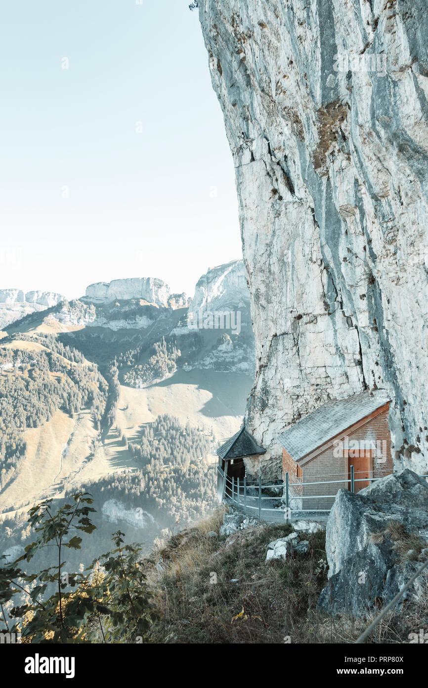 wooden mountain hut and hiking trail at the ebenalp rocks of Appenzell ...