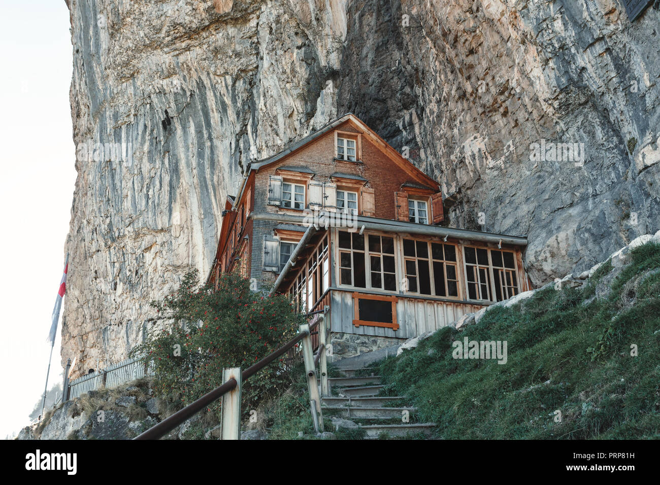 Traditional wooden mountain inn at the ebenalp rocks of Appenzell alps, Switzerland Stock Photo