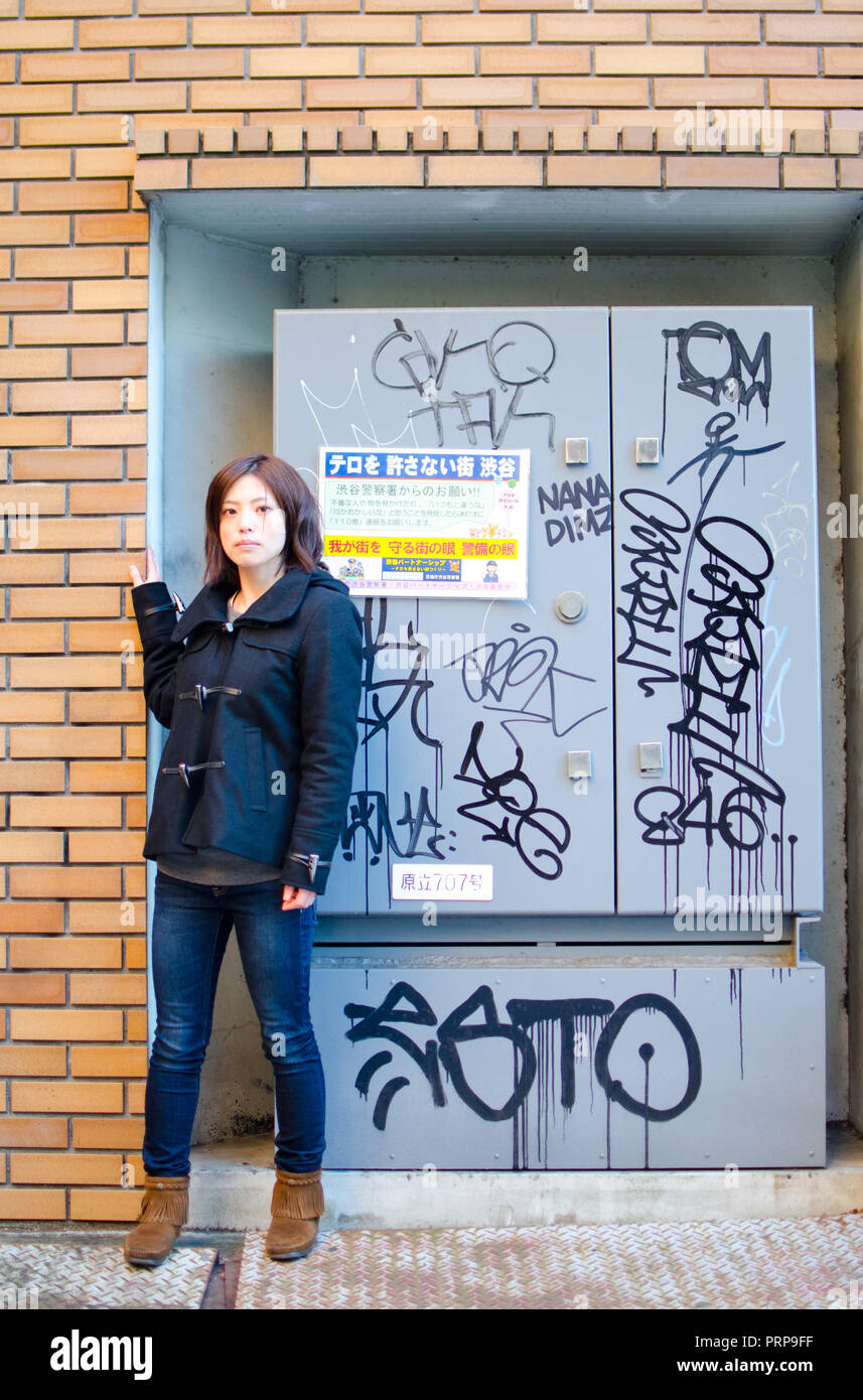 Japanese Girl poses on the street in Aoyama, Japan. Aoyama is a famous area  about universities in Tokyo Stock Photo - Alamy