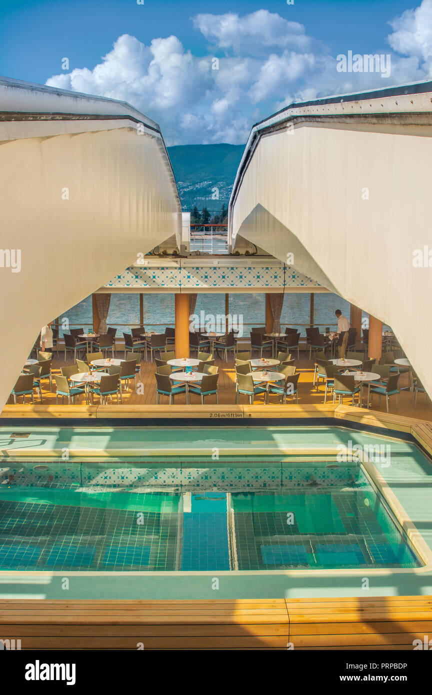 Lido Deck swimming pool under retractable roof. The Volendam, Holland