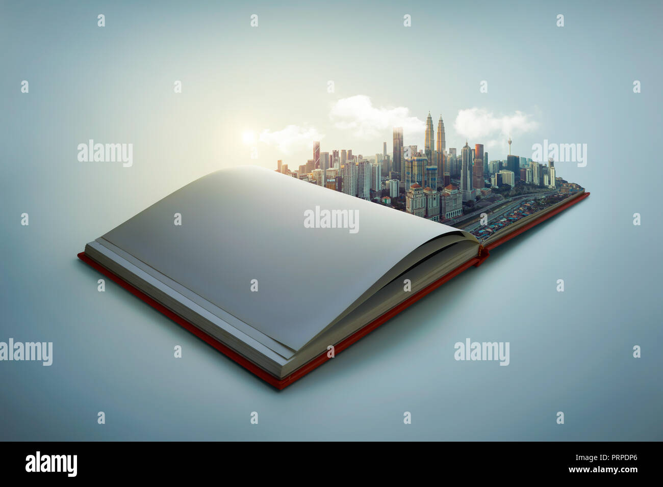 Early morning beautiful scene of modern city skyline pop up in the open book pages. Stock Photo