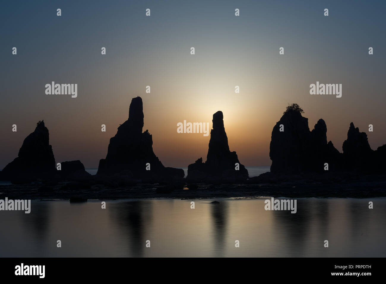 Hashi gui iwa rock at dawn sunrise. A straight line of large and small ...