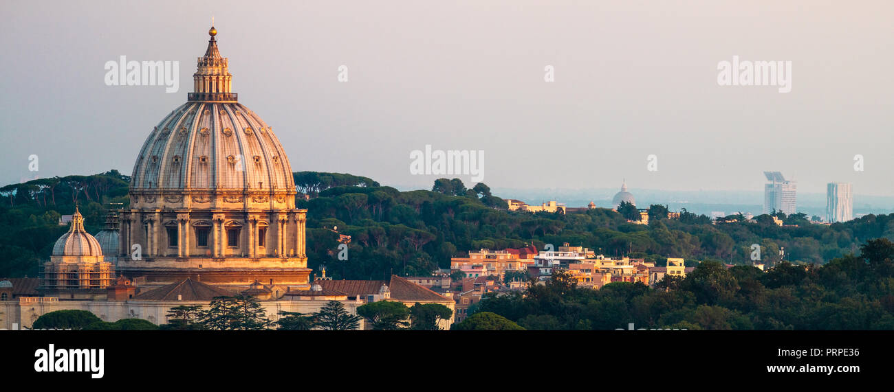 Panorama Of Rome St. Peter's Basilica and Green Landscape Sunset Lighting Stock Photo