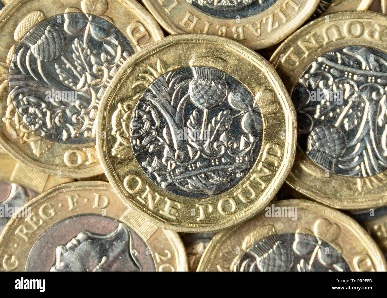 Still-life close-up of British one pound coins, Greater London, England, United Kingdom Stock Photo
