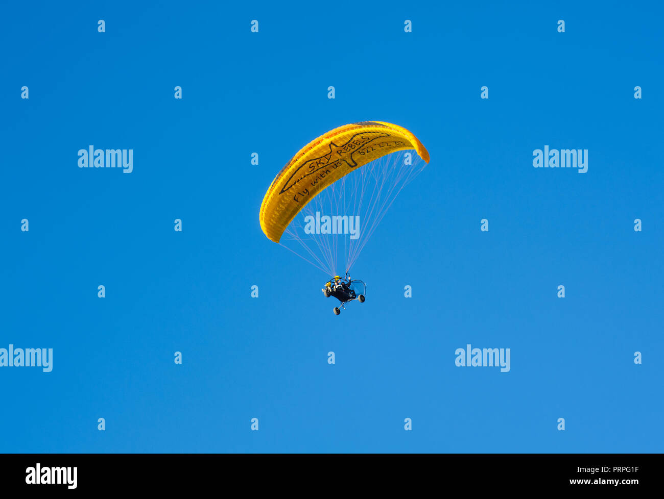 Parachute man flying at sky hi-res stock photography and images - Alamy