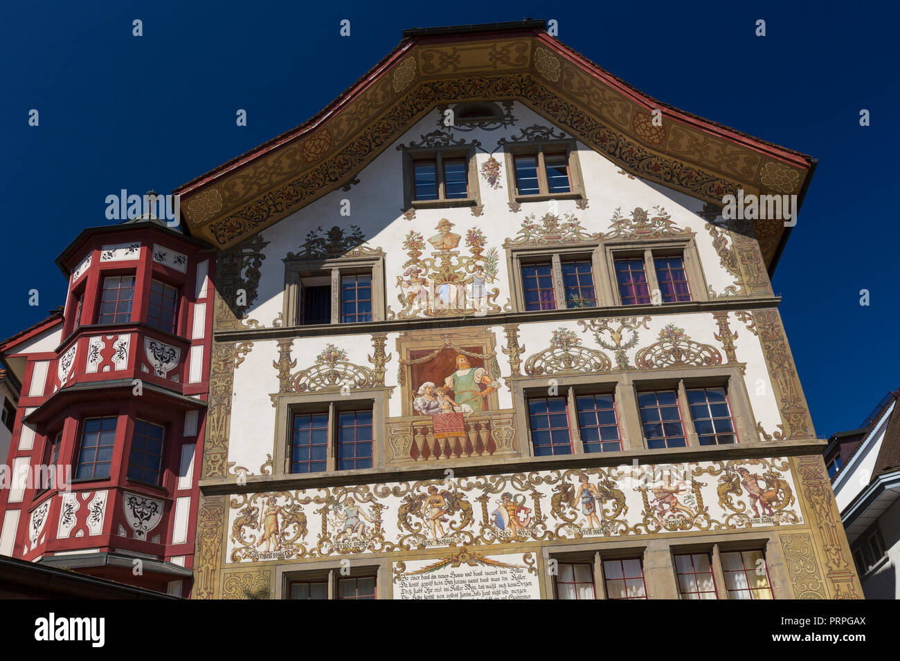 Colourful murals on the buildings in Sternenplatz, Lucerne, Switzerland  Stock Photo - Alamy