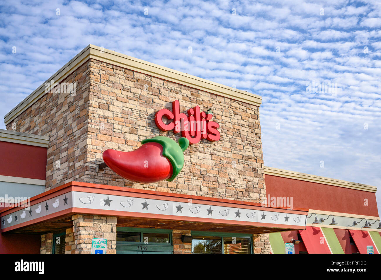 Chili's family restaurant front exterior entrance of the chain restaurant showing the corporate sign and logo in Montgomery, Alabama USA. Stock Photo