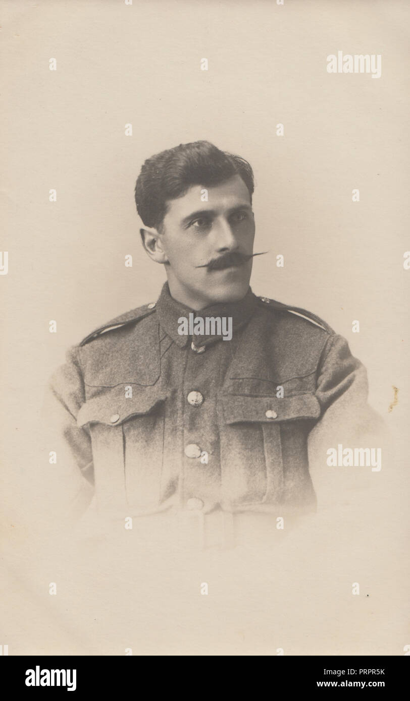 * Vintage 1916 Woking, Surrey Photograph of a WW1 British Army Soldier With a Large Moustache. Named on the back as Percy C. Stock Photo