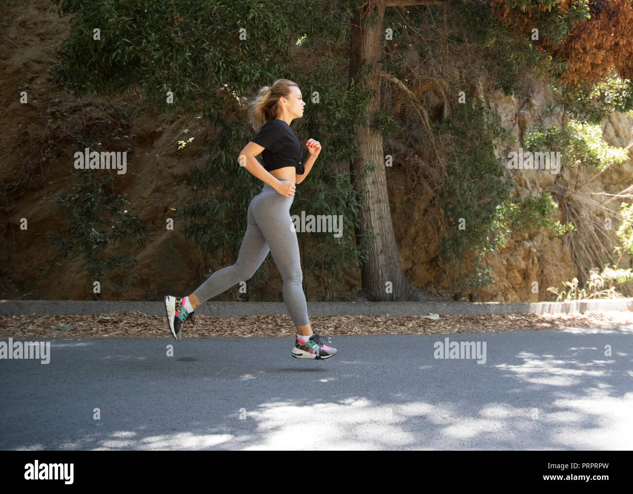 Black woman running park hi-res stock photography and images - Alamy