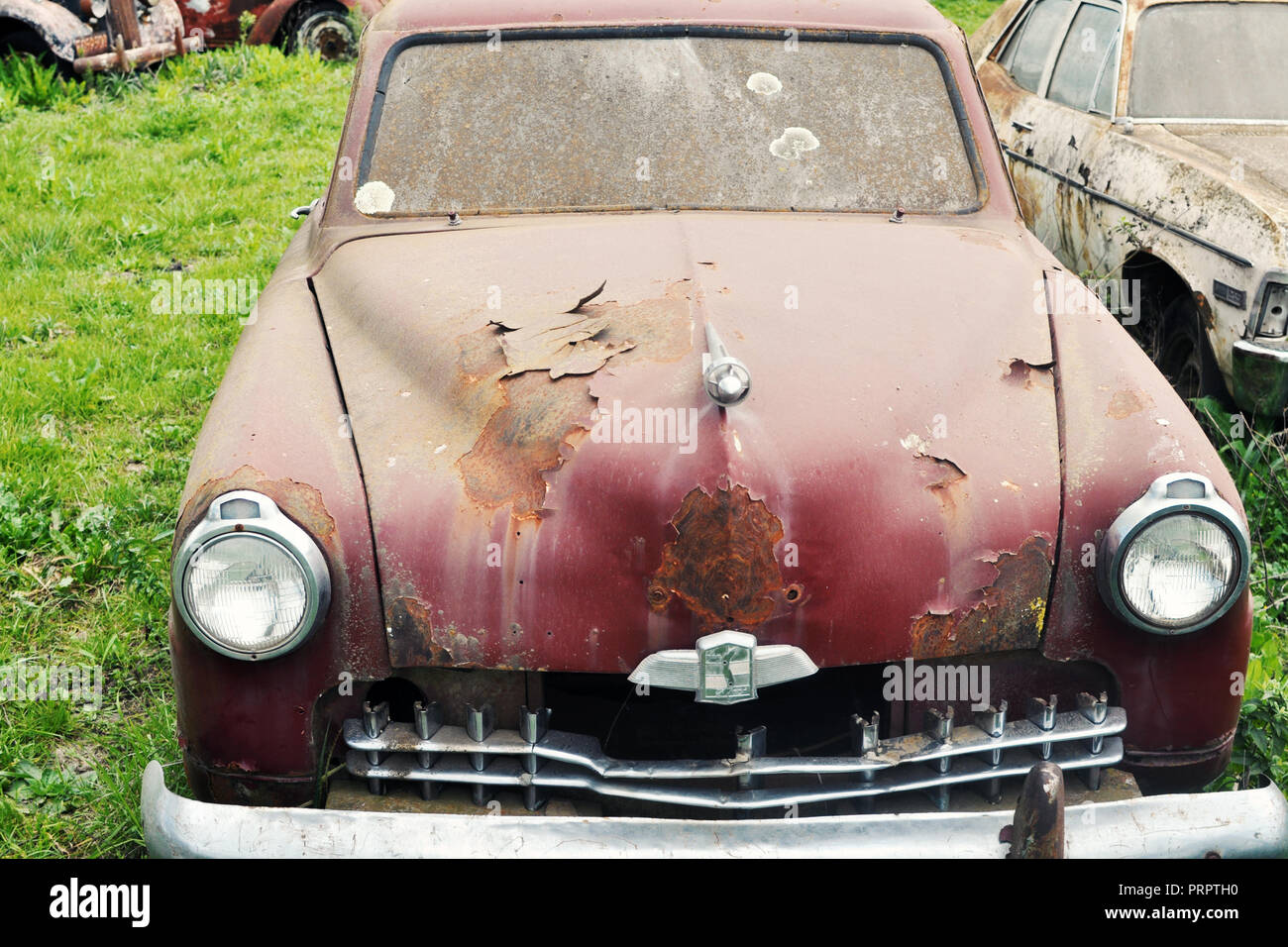 Cemetery Car, Abandoned old car in garage. Retro and vintage style