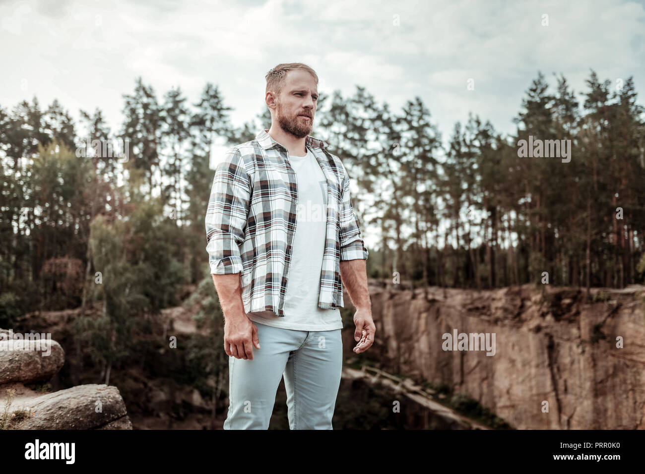 Man wearing jeans in forest hi-res stock photography and images - Alamy