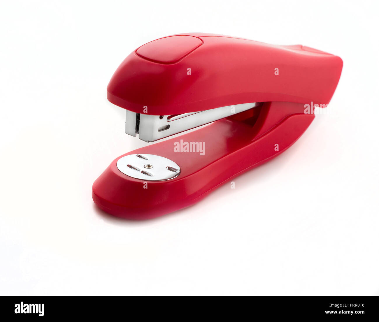Red stapler close up isolated on white background Stock Photo