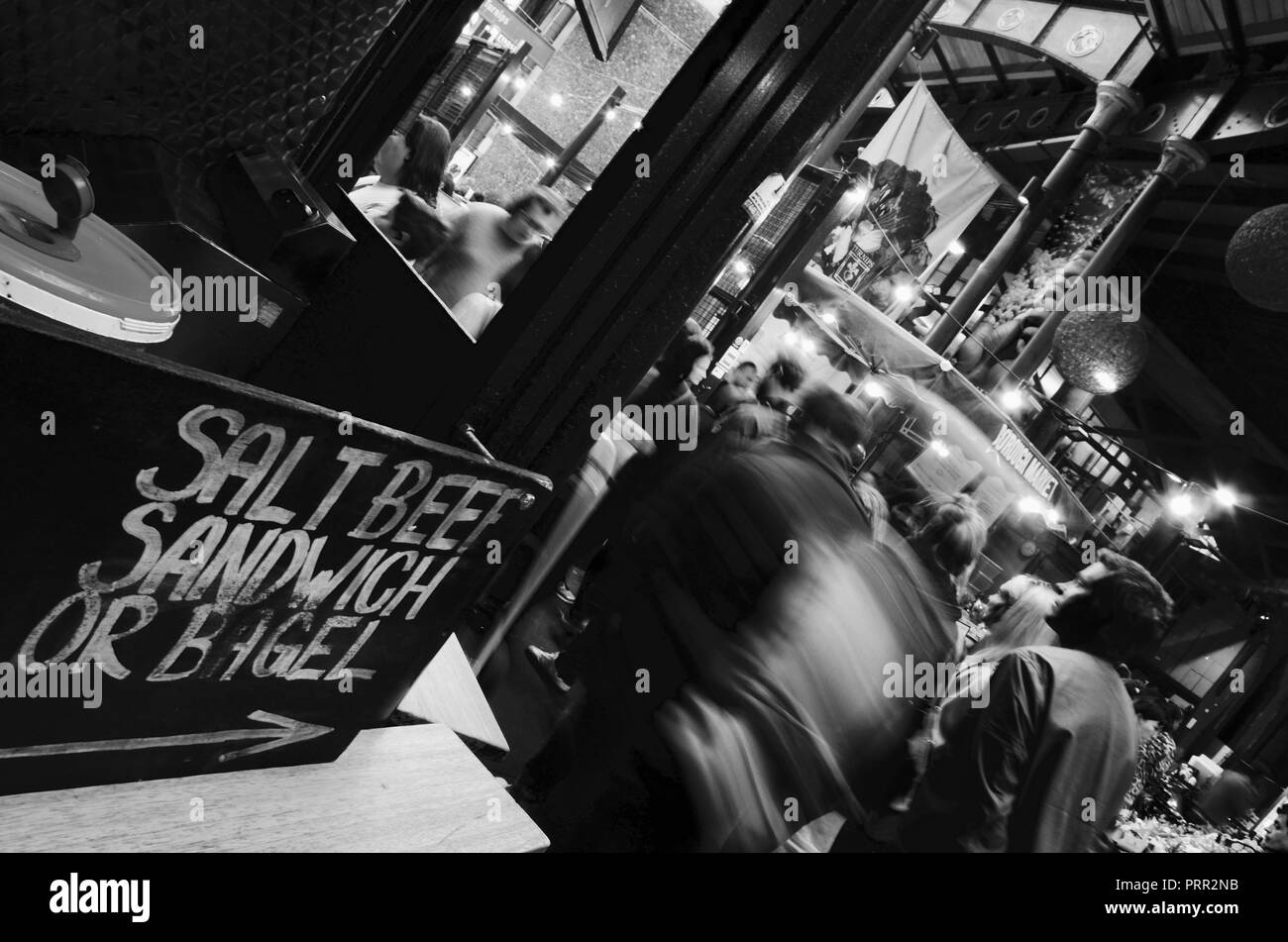 Black and white photograph. Salt beef sandwich and bagel sign, Borough Market, Southwark, London, England, UK. Stock Photo